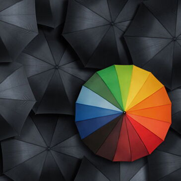 colored umbrella on dark background