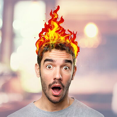 man with head on fire from inflammation